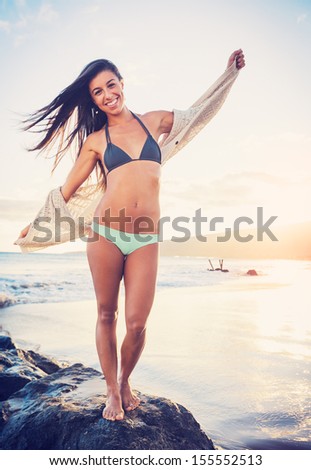 Beautiful Young Woman on the Beach at Sunset, Dreamy Lighting