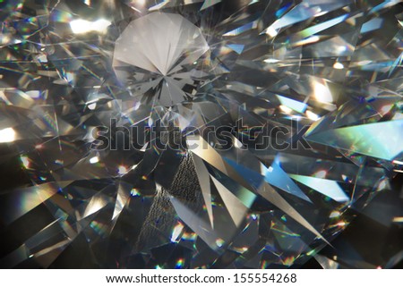 layered triangular macro diamond shapes with a small diamond over them     
