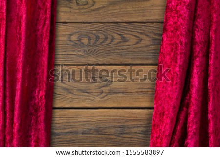 Wooden background and red curtain