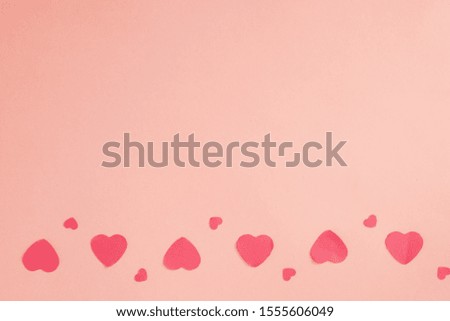 Romantic greeting card. Creative heart pattern pale pink background. Copy space.