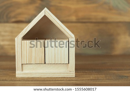 calendar of wooden cubes in the shape of a house