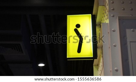Lightbox Toilet Signage hang on wall