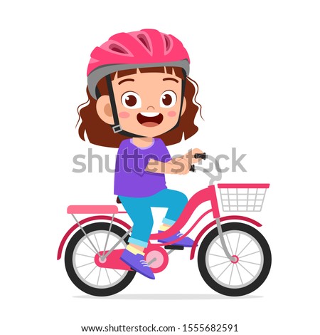 happy cute kid girl riding bike smile