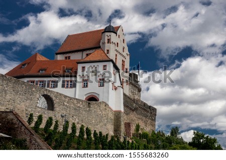 Medieval castle view from below. The clouds