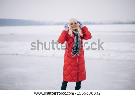 Woman ice skating at the lake