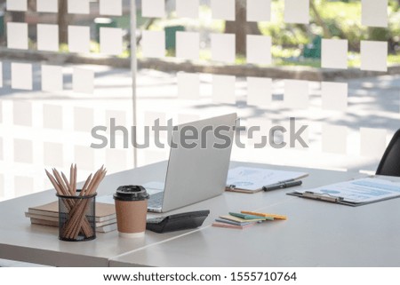 modern office workspace desk with laptop computer and office supplies. - business workplace concept