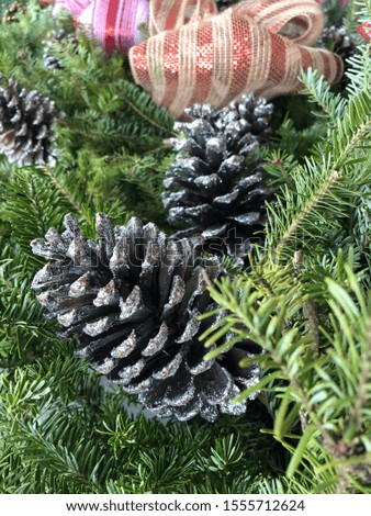 Christmas pine decoration ornaments on a fir branches 