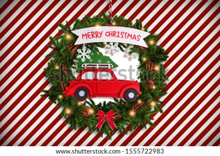 Christmas wreath decoration with red car