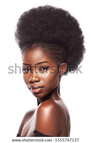Young Beautiful African Woman Isolated on White Background. Black Model with Afro in Beauty Hairstyle Concept. Royalty-Free Stock Photo #1555767137
