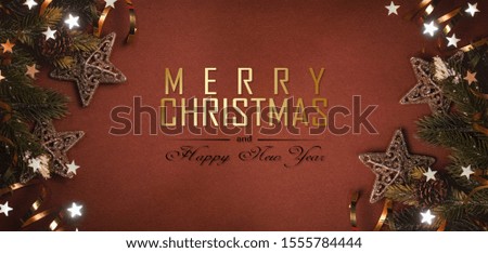 Christmas composition. Gifts, fir tree branches, decorations on holiday background. Christmas, winter, new year concept.