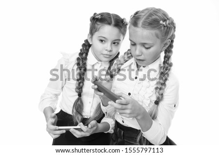 Digital technology for teaching and learning. Small children using mobile technology in classroom isolated on white. Promoting technology in education. The benefits of educational technology.