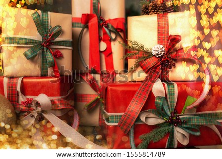 Marry Christmas and happy New Year celebration. Family gifts boxes and design home decor.