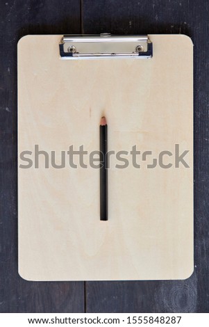 A studio photo of a clip board