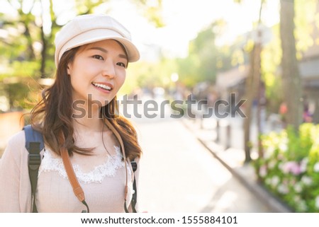Beautiful young asian woman who travels in Kyoto,Japan