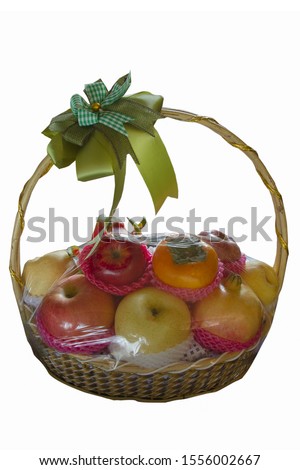 Healthy fresh fruit gift basket isolate on white background