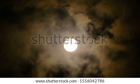 Beautiful Full moon shining and cloudy and dark night sky
