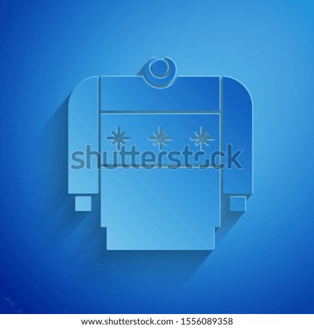 Paper cut Christmas sweater with norwegian ornaments and holidays decorations icon isolated on blue background. Knitted winter jumper. Paper art style. Vector Illustration