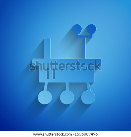 Paper cut Mars rover icon isolated on blue background. Space rover. Moonwalker sign. Apparatus for studying planets surface. Paper art style. Vector Illustration