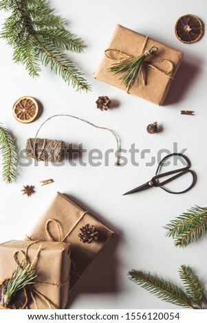 wrapping gifts concept for holiday on white background top view mock up