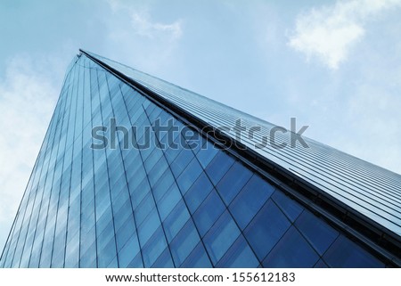 The Shard towering over London, photographed in London, UK. Built in 2012 and standing 306 meters tall, the Shard is currently the tallest building in the European Union and a new London attraction. Royalty-Free Stock Photo #155612183