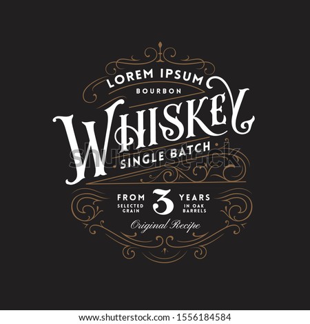 Vintage Whiskey Label Logo with Fancy Lettering and Ornate Flourished Frame Royalty-Free Stock Photo #1556184584