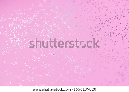 pink festive glitter background selective focus