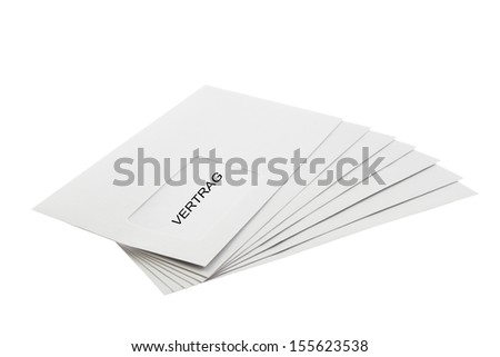 A Batch of Envelopes labeled with the word Vertrag (German contract) isolated on White Background
