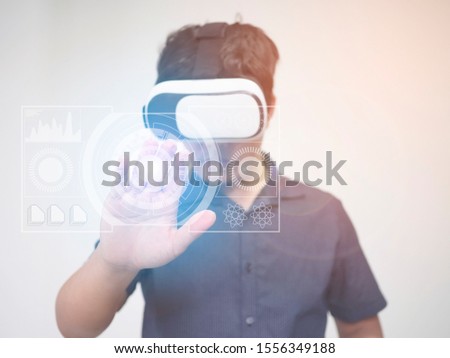 Digital Screen with young man using a virtual reality headset in the technology VR experience concept