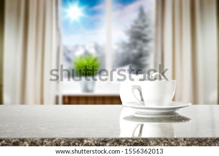 Table background of free space and christmas window background. Copy space. 