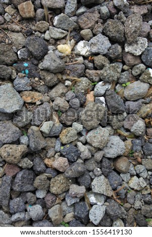 Background, a collection of gravel