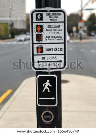 Pedestrian walk sign instructions and panel with button