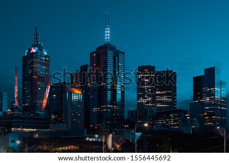 Modern skyscrapers buildings in Melbourne business district. Night architecture. Royalty-Free Stock Photo #1556445692