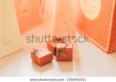 Red gift box and shopping bag for holidays