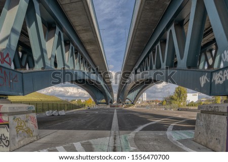 New modern road Bridge over Spree river in Berlin Germany