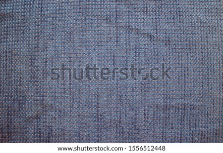 The texture of the fabric is blue. Background for design.