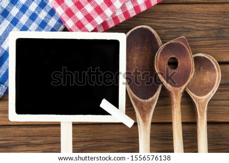 Wooden cooking spoons and board