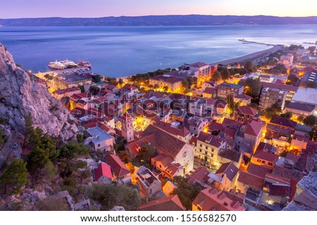 Aerial view of the old medieval historic city at sunset. Omis. Croatia.