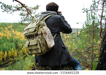 Tourist walk of a city dweller in the forest of the northern Urals.