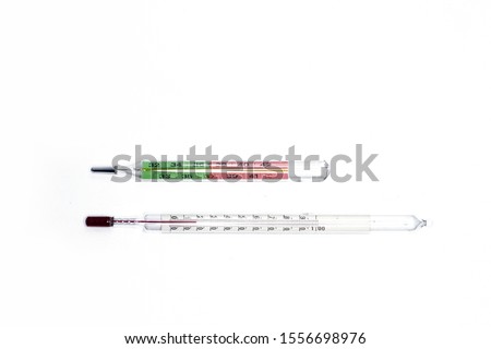 Different types of thermometers. Medical tools for measuring temperature for the body and for water isolated on white background.
