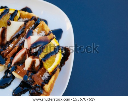 Viennese waffles with lemon. drenched in chocolate. 