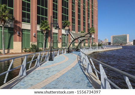 Clean and beautiful Jacksonville Riverwalk, one and a quarter mile paved promenade along the St. Johns River in downtown Jacksonville, Florida, USA. 