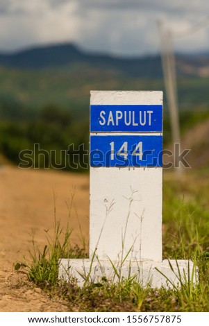 Distance marker of the Kalabakan-Sapulut-Road in Sabah, Malaysia, showing the distance in kilometers to Sapulut