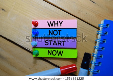 Why Not Start Now text on sticky notes isolated on the tables