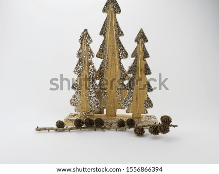 Christmas tree made of wood. Ecological concept. Tiny cones at the bottom, white background, front picture
