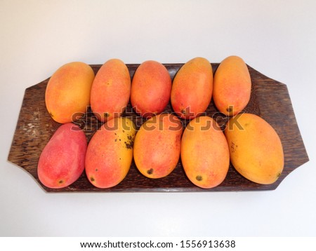 Podang mango (mangifera indica, pelem podang). In Indonesia, it's called podang suluh, it's mean this mango ripe on tree. this is the exotic fruit from indonesia.
