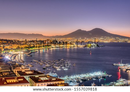 The Gulf of Naples with Mount Vesuvius before sunrise Royalty-Free Stock Photo #1557039818