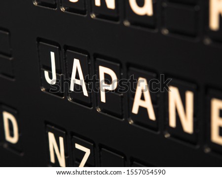 Signs name of Japan country on black directory board. Used for For currency exchange, airport, business, finance or travel concept, Signs and symbols.