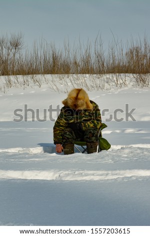 winter fishing in cold Siberia