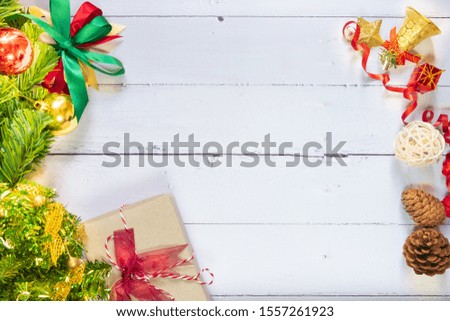 Christmas composition festive background. Christmas decorations and xmas gift boxes on wooden white table. Celebration for holiday concept, New Year, winter. Flat lay, top view with copy space