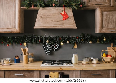 Part of the kitchen set, decorated for Christmas and New year Royalty-Free Stock Photo #1557266897